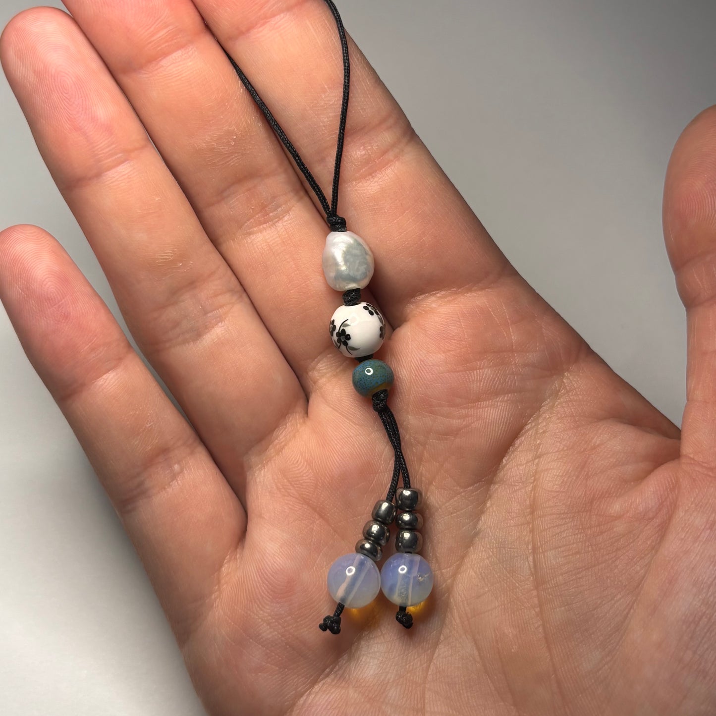 moonlit garden cord charm