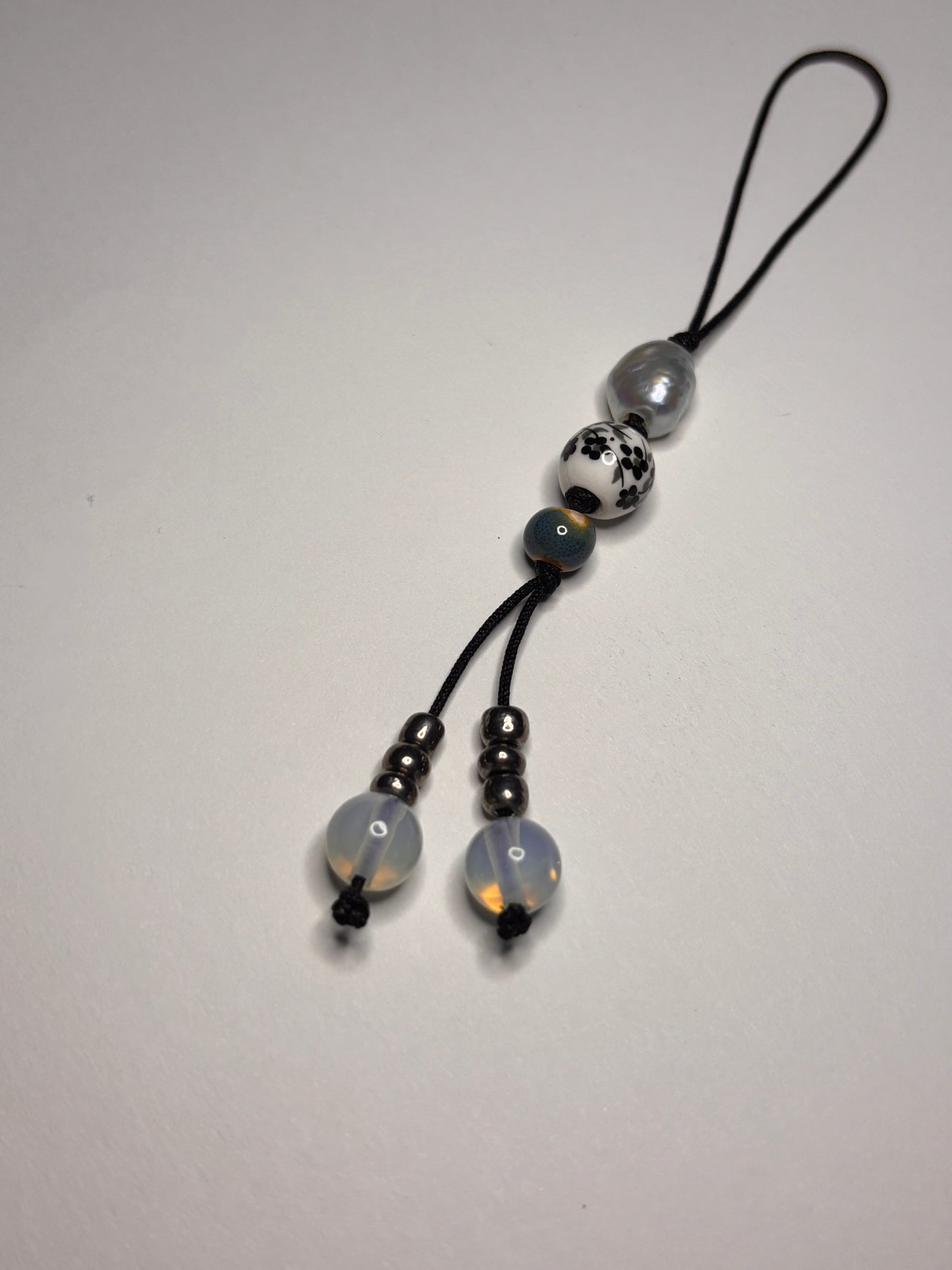 moonlit garden cord charm