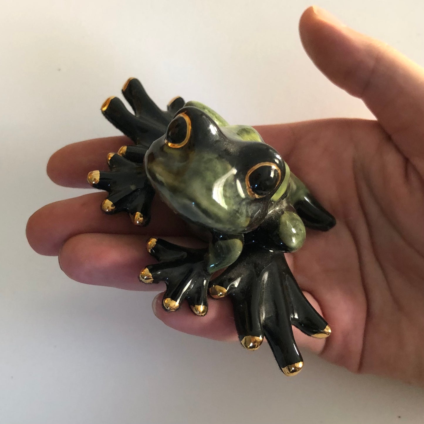 Ceramic frog figurine