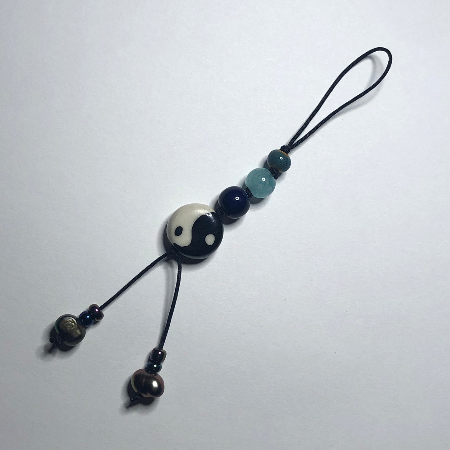 stillness lanyard cord charm