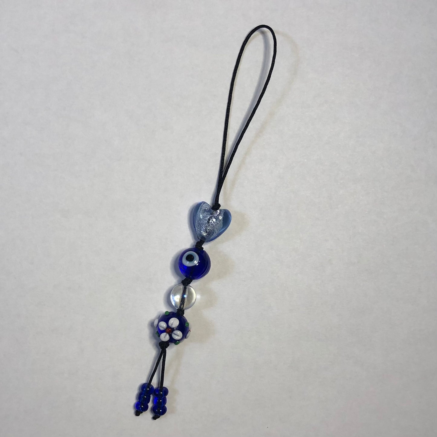 Beaded cord charm