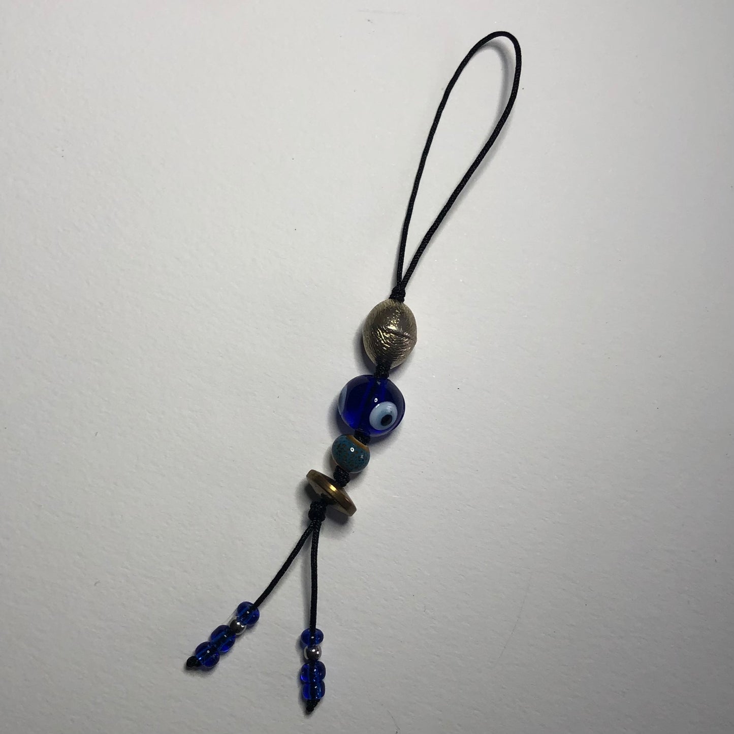 Beaded cord charm