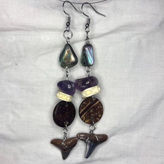 shark tooth, abalone, coconut, amethyst, and fish vertebrae earrings