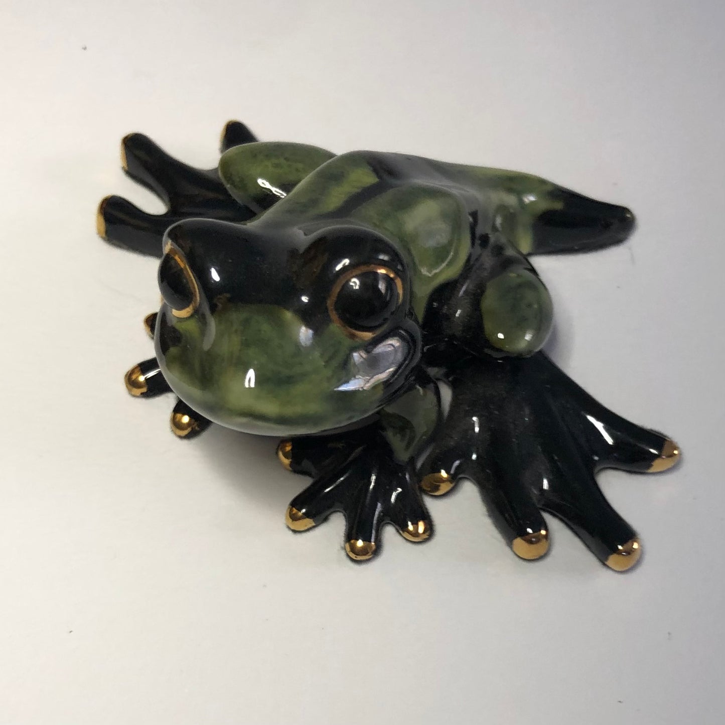 Ceramic frog figurine