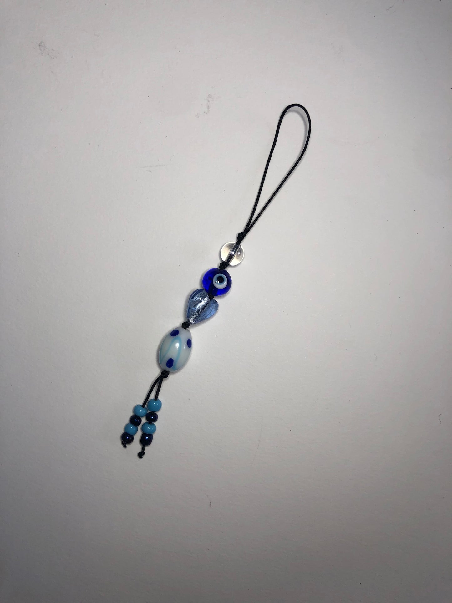 Beaded cord charm