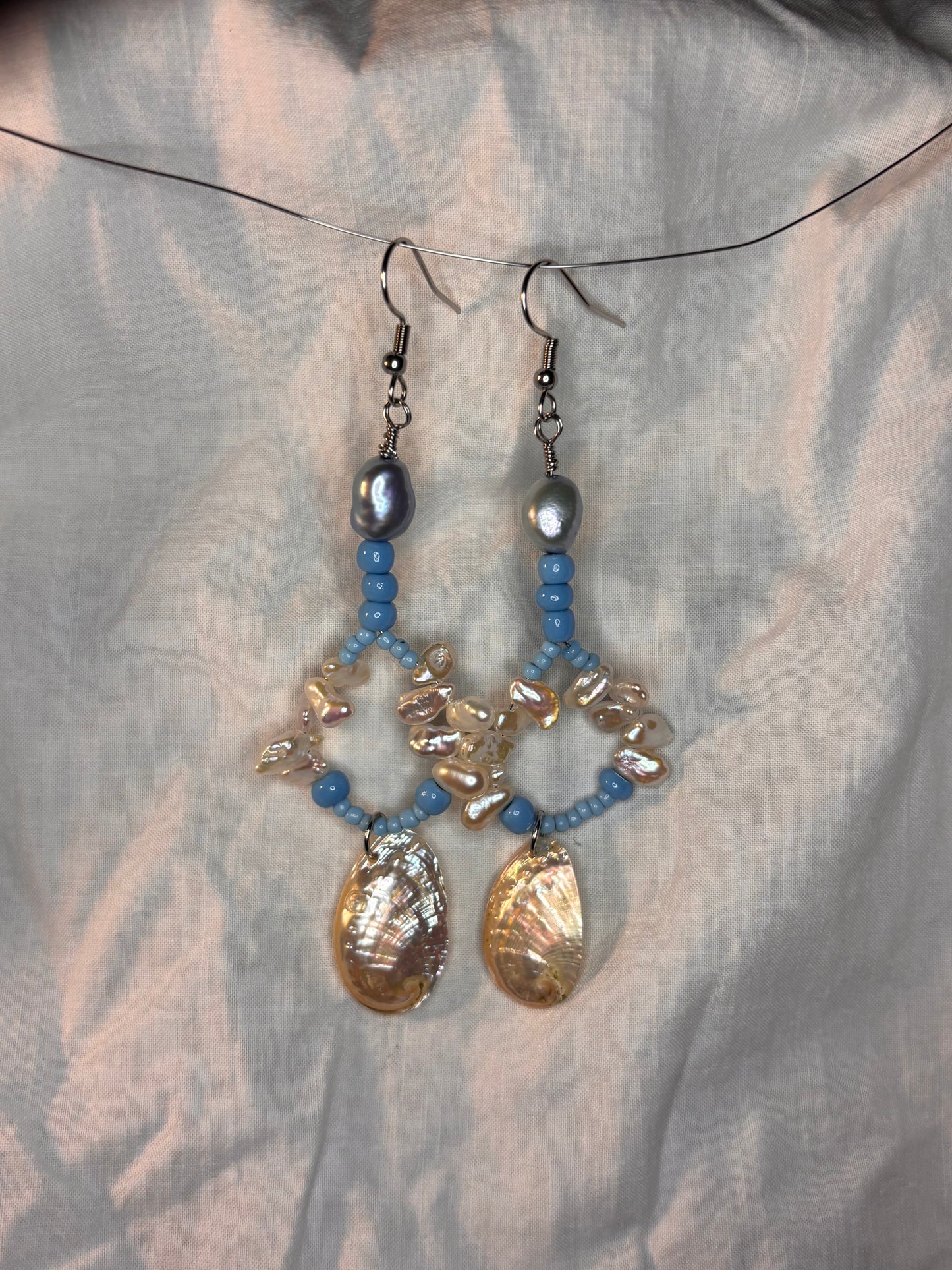 pearl, abalone, and blue glass beaded loop earrings