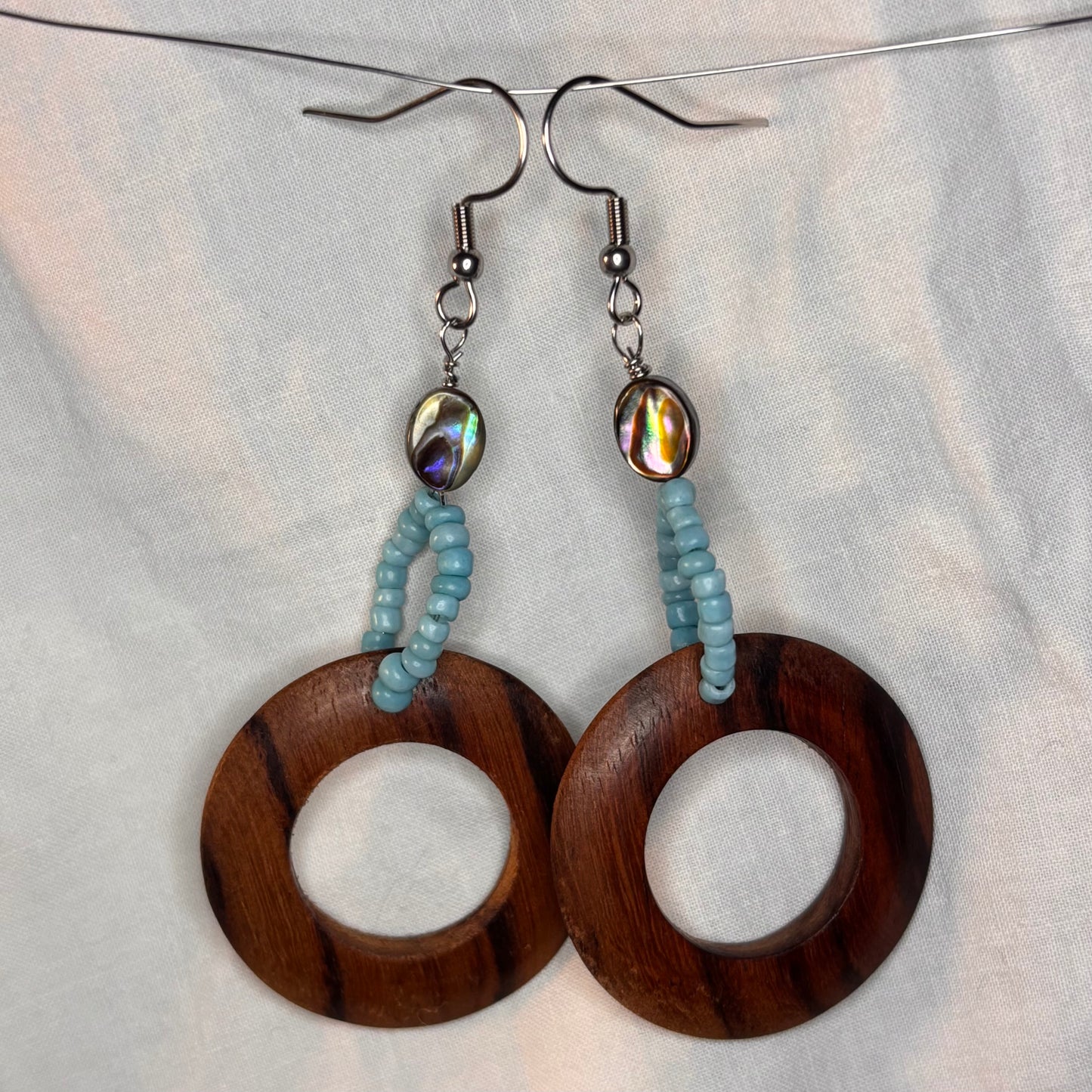 wood hoop, abalone, and blue beaded earrings