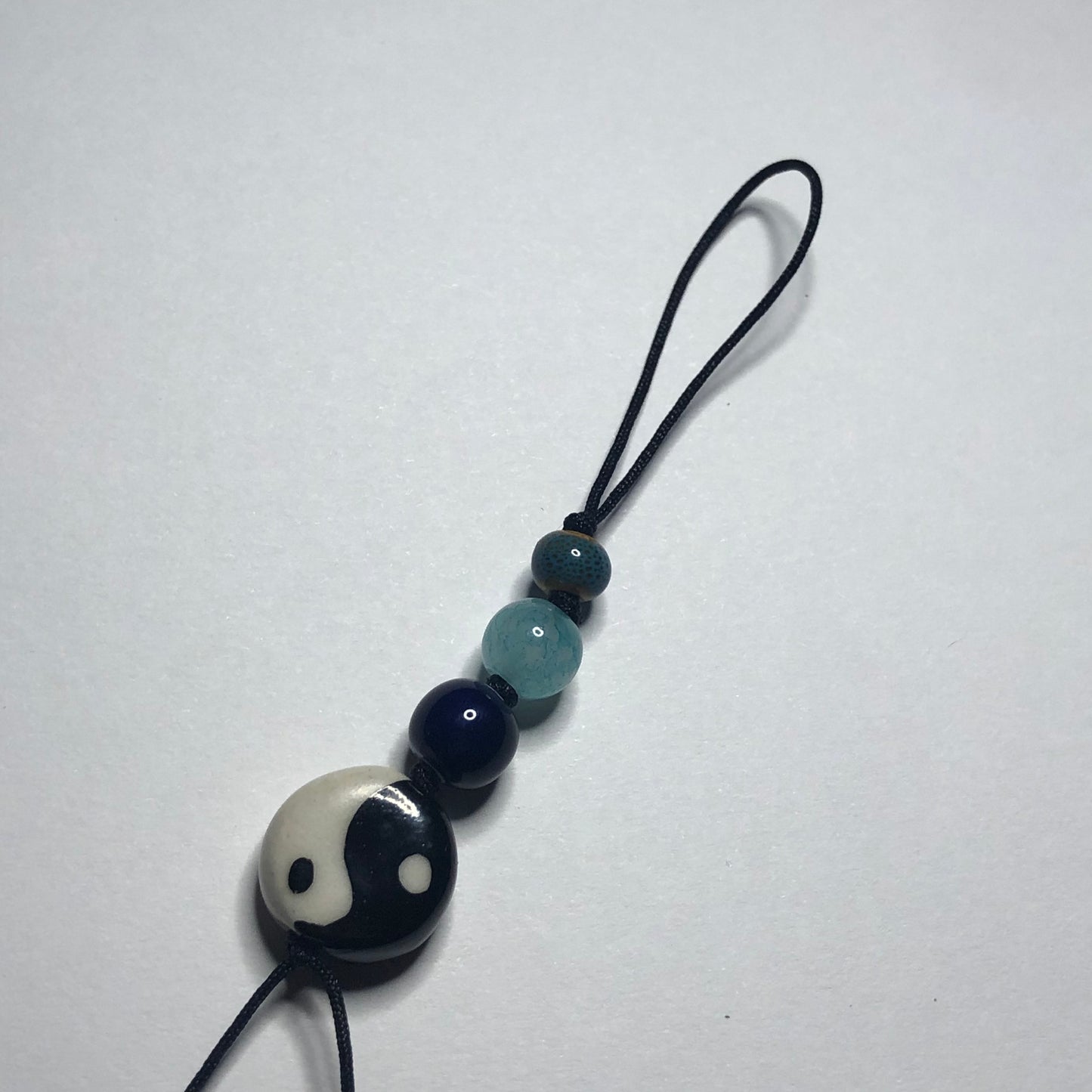 stillness lanyard cord charm