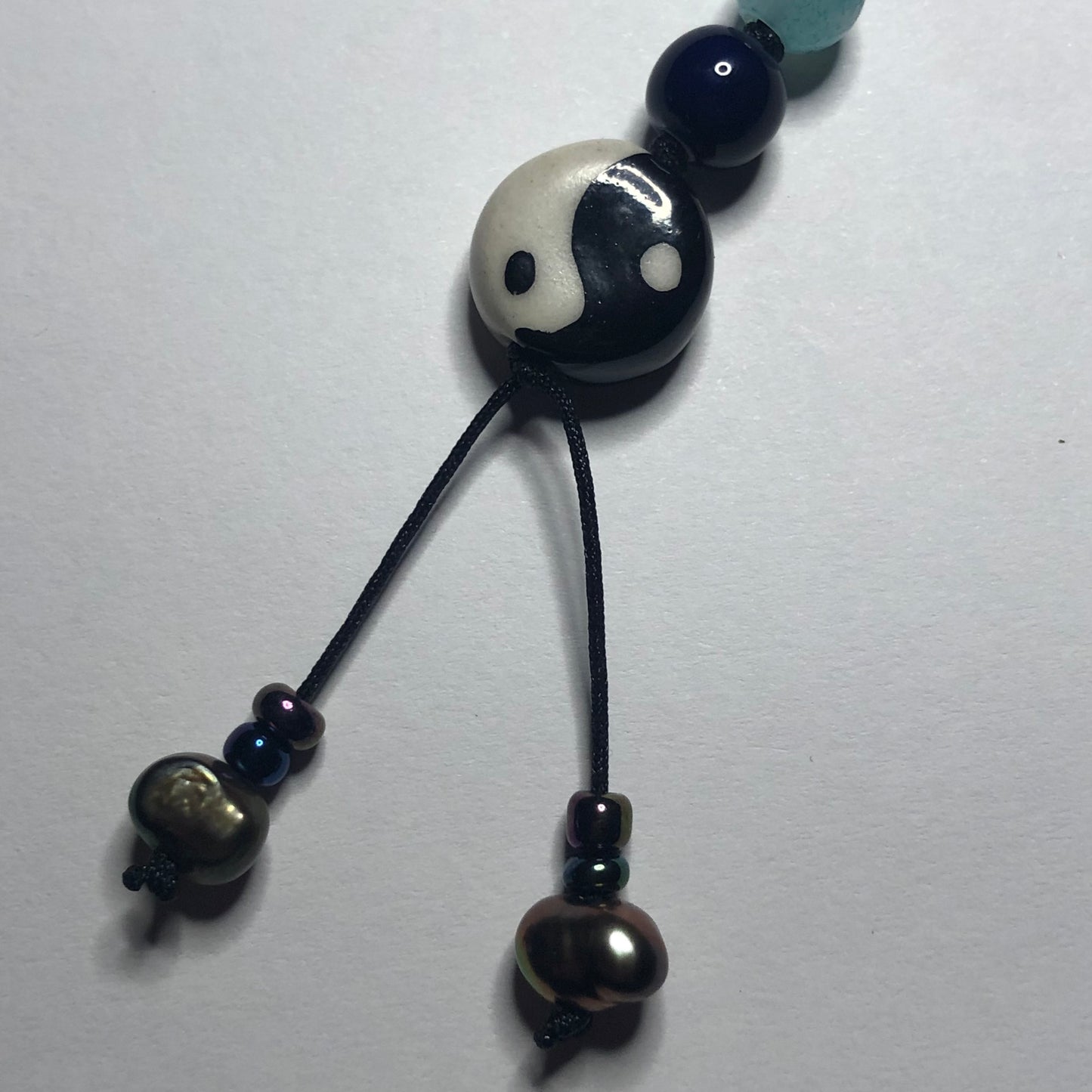 stillness lanyard cord charm