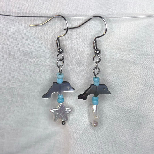 shell dolphin, pearl, and glass beaded earrings